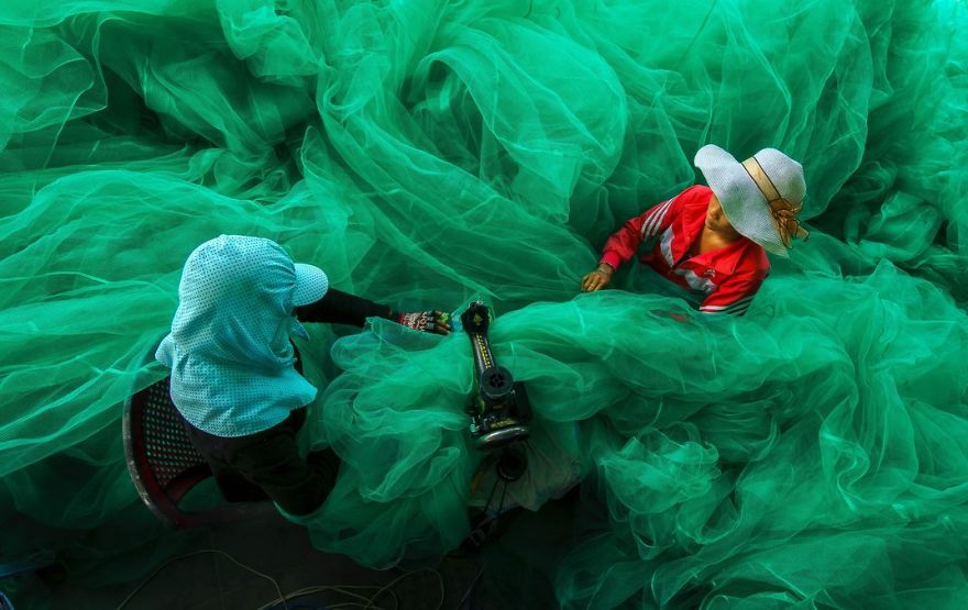 Women Of A Small Village Near Vinh Hy Bay, Vietnam, Sew A Fishing Net While Their Husbands Fish, Vinh Hy Bay, Ninh Thuan, Vietnam
