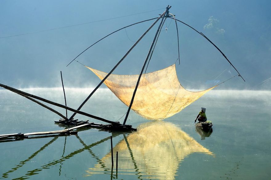 A Fisherman Checks His Net In The Early Morning, Lam Dong, Dalat, Vietnam