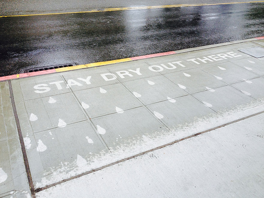 Artist Creates Water-Activated Street Art To Make People Smile On A Rainy Day