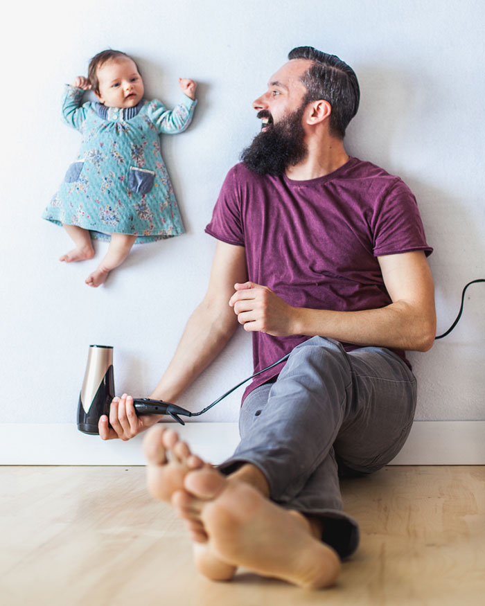 Fun Pictures Of Dad Playing With Newborn Daughter (No Photoshop)