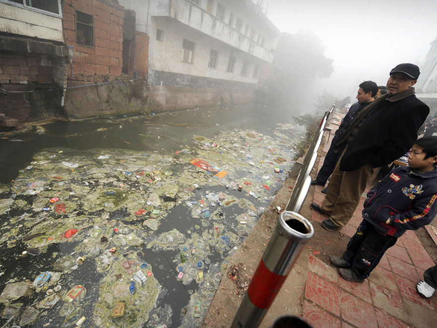 Residents Look At A Heavily Polluted River, Zhugao, Sichuan Province