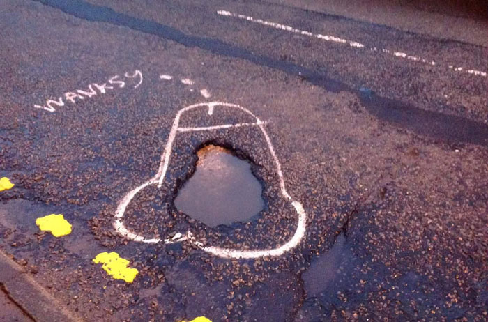 Anonymous Artist ‘Wanksy’ Draws Penises On UK Potholes To Make Government Fix Them