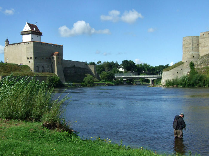 Hermann Castle And Ivangorod Castle On The Estonian-russian Border, Formed By The Narva River.