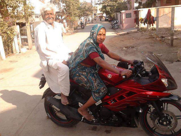 Indian Couple Driving A Motorcycle