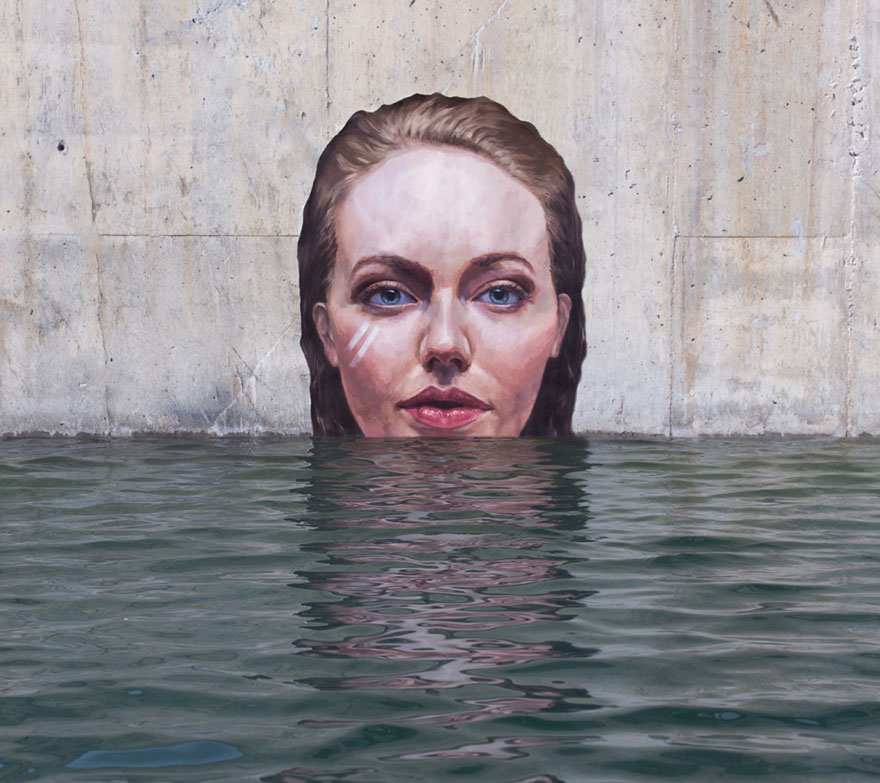 Artist Paints Stunning Seaside Murals While Balancing On A Surfboard