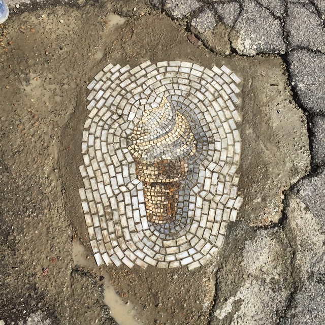 Chicago Doesn't Fix Its Potholes, So This Artist Fixes Them With Ice Cream Mosaics