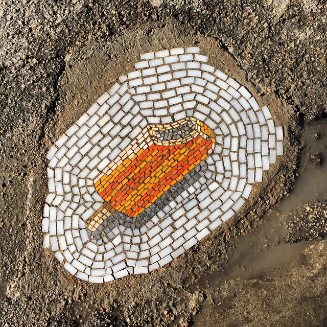 Chicago Doesn’t Fix Its Potholes, So This Artist Fixes Them With Ice Cream Mosaics
