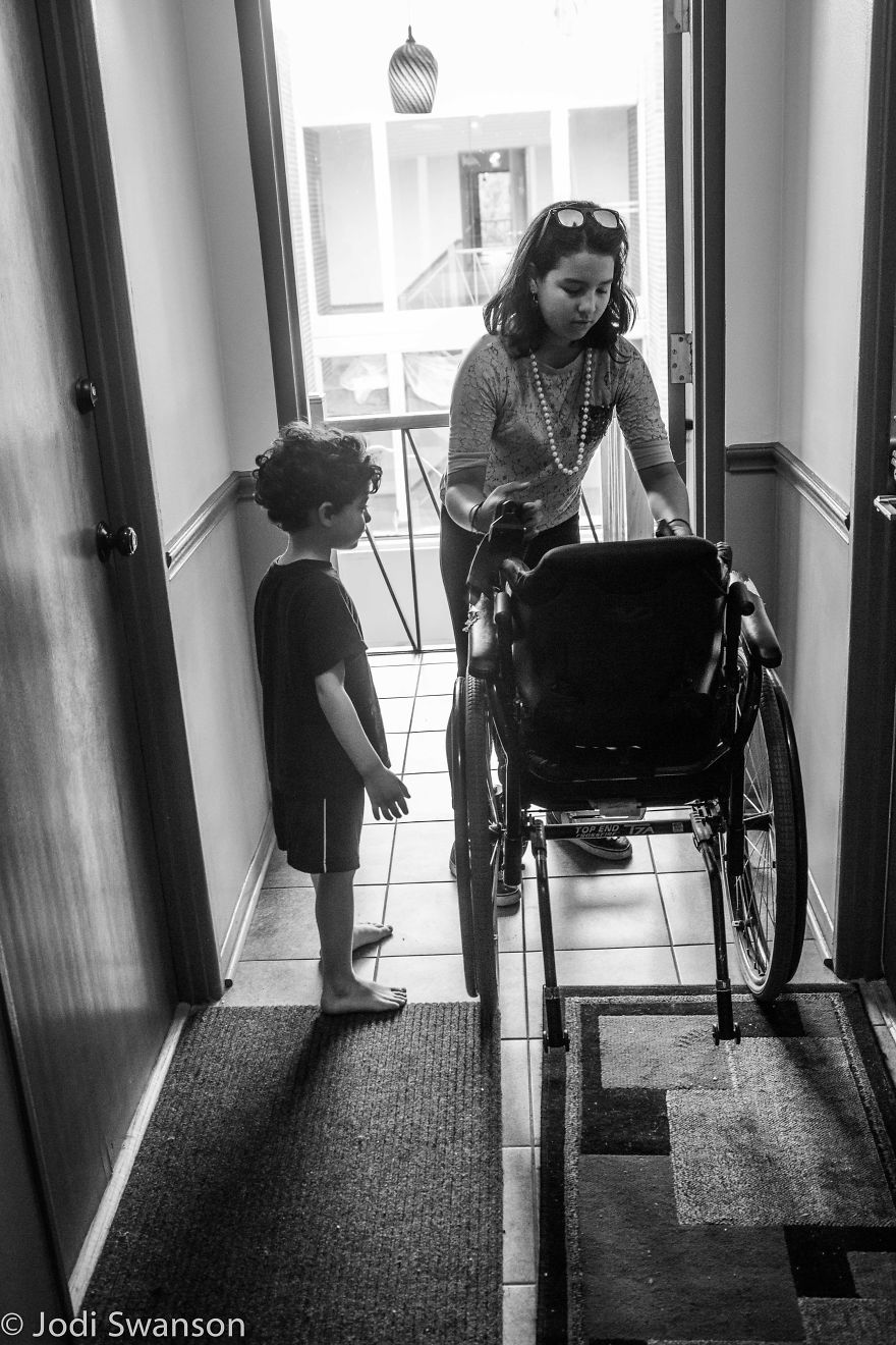 Every Day, Children Carry This Handicapped Woman Down 3 Floors Because There's No Elevator