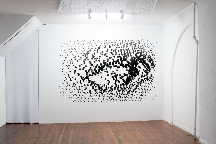 1,252 Floating Balls Form An Eye When Looking From The Right Angle