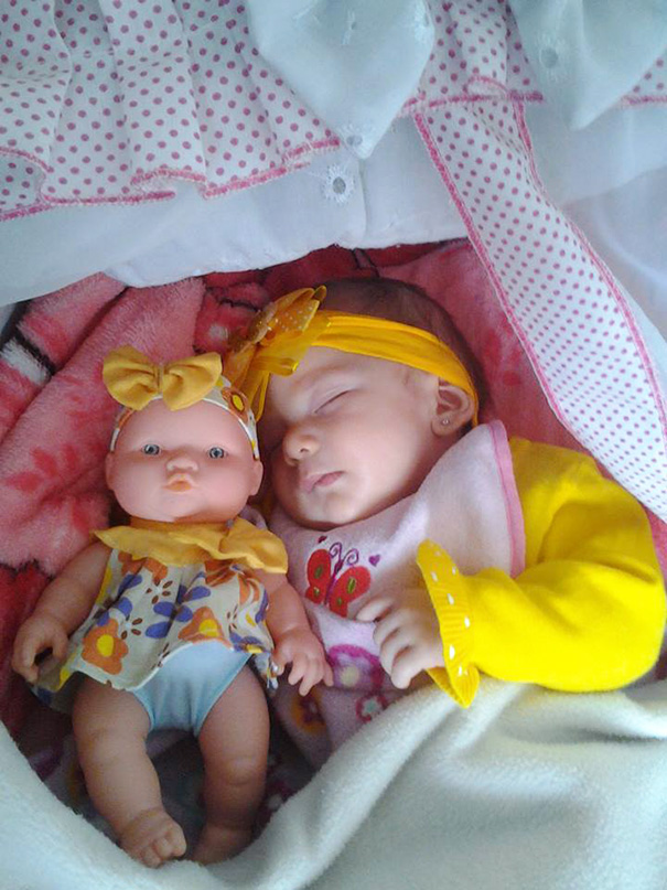 Baby With Her Look Alike Doll