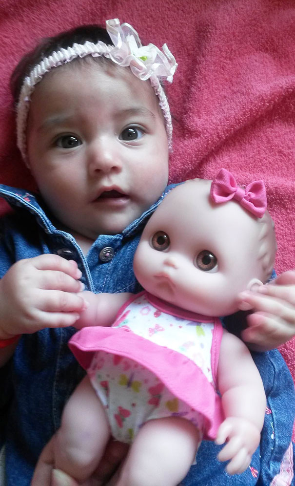 Baby Girl With Her Look Alike Doll