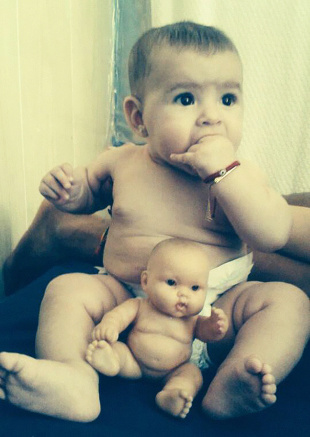 Baby With A Look Alike Doll