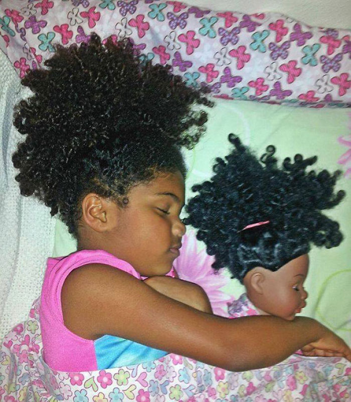 Girl With Her Look Alike Doll