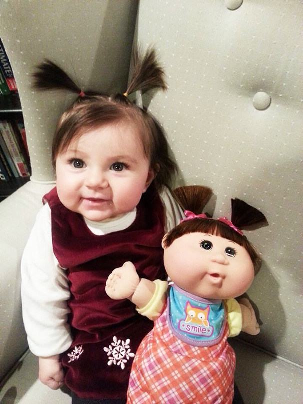 Baby And A Look Alike Doll
