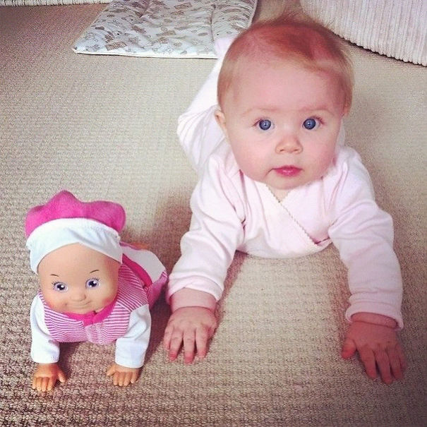 Baby With Her Look Alike Doll