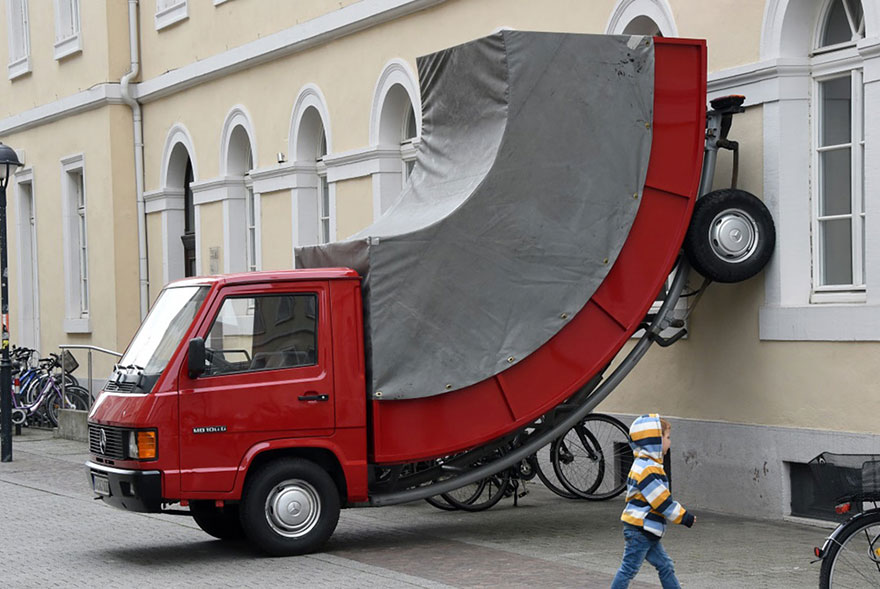 The German City Of Karlsruhe Just Issued A Parking Ticket To A Bent Car Sculpture By Austrian Artist Erwin Wurm