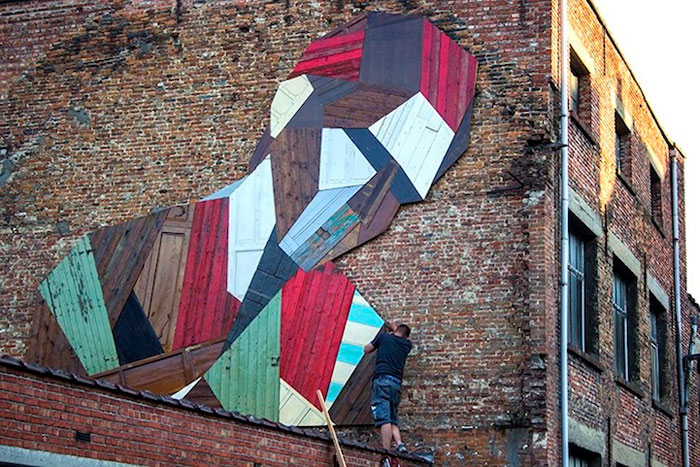 Artist Turns Old Wooden Doors Into Giant Street Art Murals