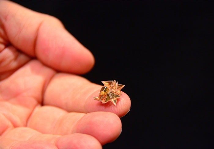 Mini Origami Robot That Self-Folds, Walks, Swims, Digs, Carries Loads, Climbs And Dissolves Into Nothing