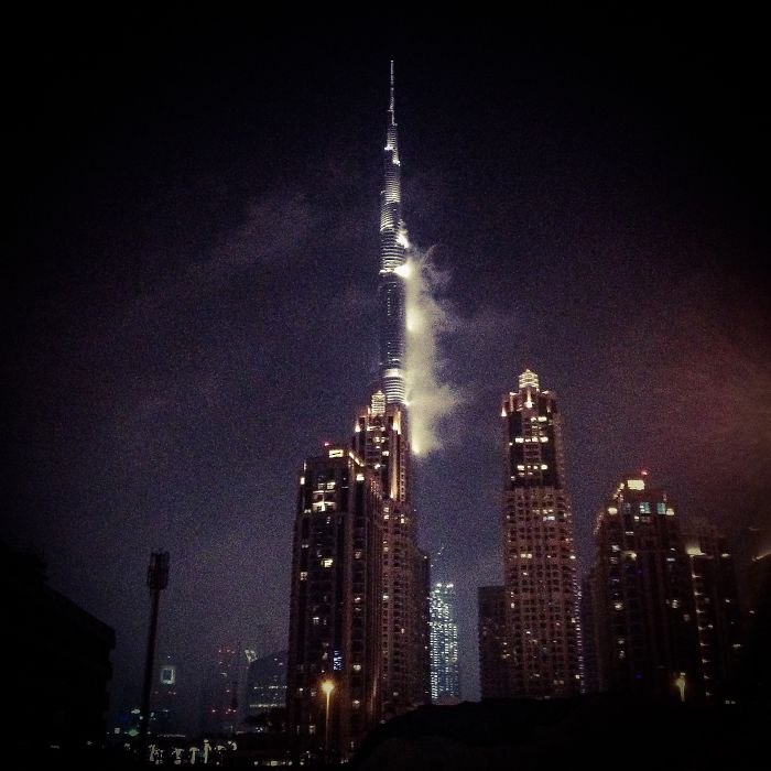 Condensation On Burj Khalifa In Dubai Forms Face & Hair