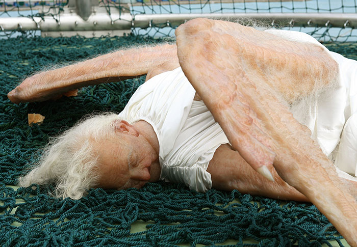 Terrifying Hyper-Realistic Sculpture Of A Fallen Angel By Chinese Artist Duo