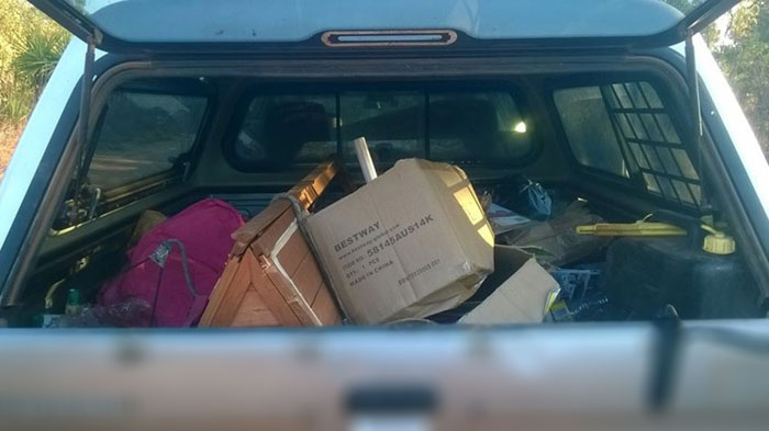 Illegal Dumper Leaves ID In His Trash And Gets It Returned To His Front Yard