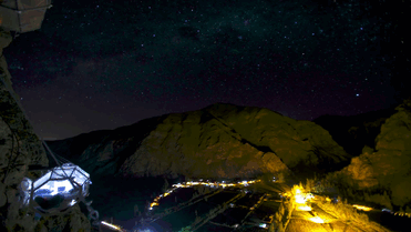 Terrifying See-Through Sleeping Capsules Hang 400 Feet Above Peru's Sacred Valley