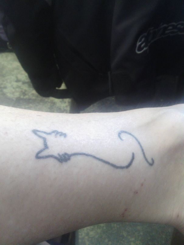 Lined cat tattoo
