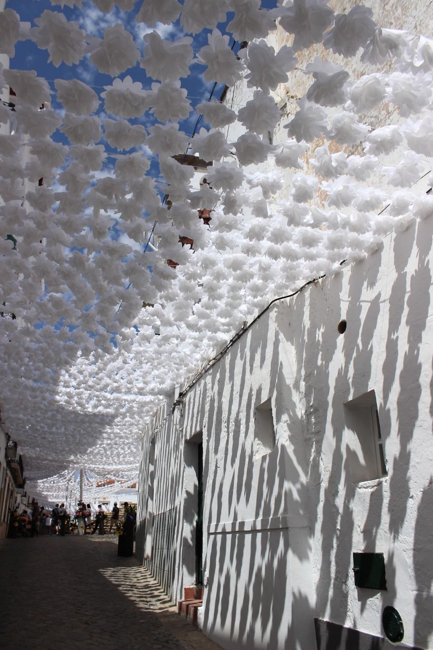 1000s Of Handmade Paper Flowers Cover The Streets Of Alentejo, Portugal