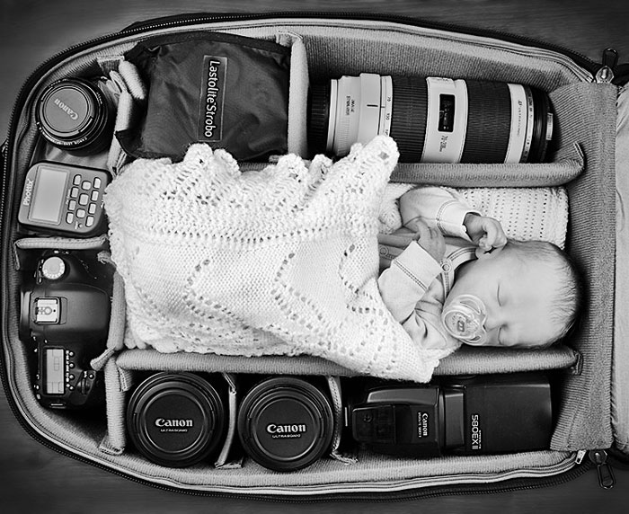 Baby In Camera Bag