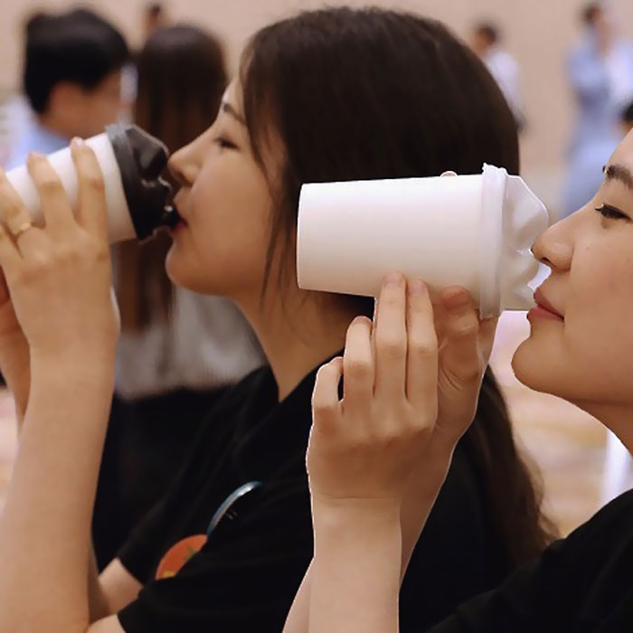 Human Face Coffee Lids Let You Kiss Your Morning Cup