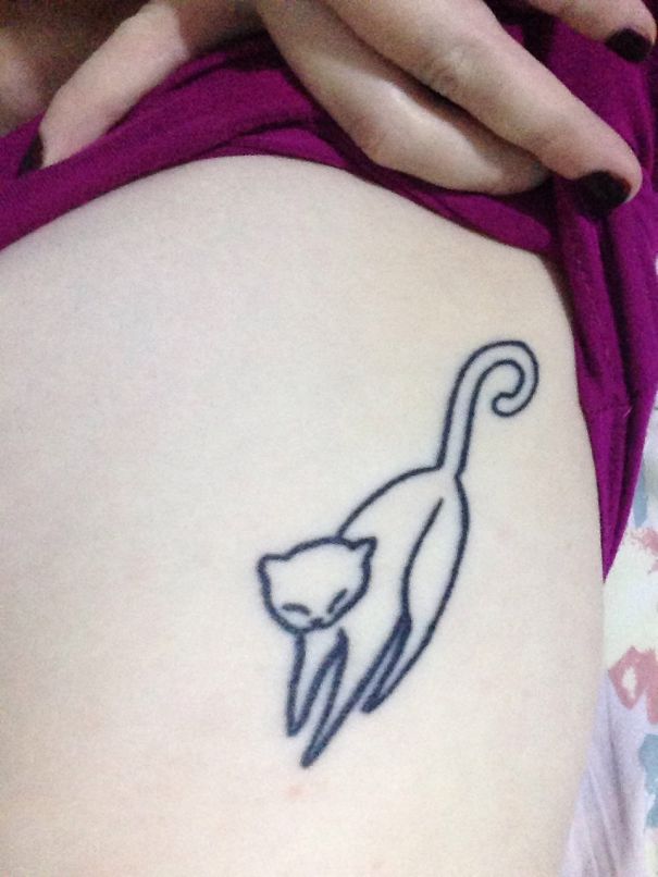 Line cat stretching tattoo