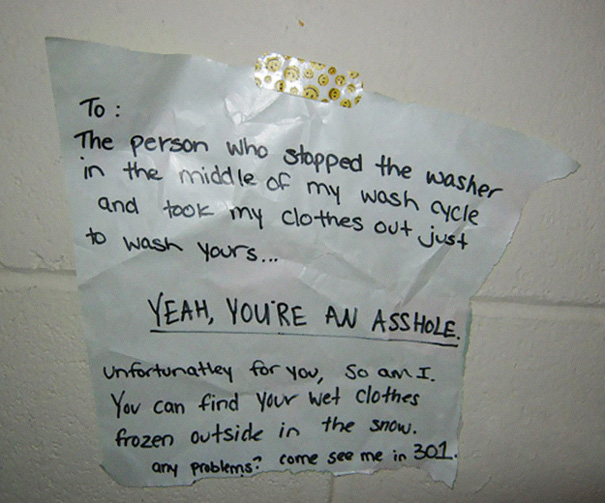 Wrapping-Paper Note Stuck To The Wall With A Band-Aid