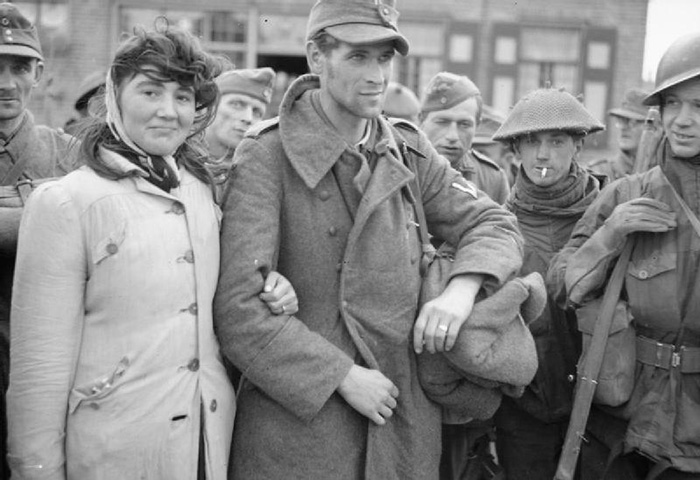 Among The Prisoners Taken On Walcheren Was This Dutch Woman With Her Husband, A German Solder, Whom She Refused To Leave (1944)