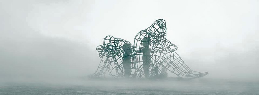 Powerful Sculpture At Burning Man Shows Inner Children Trapped Inside Adult Bodies