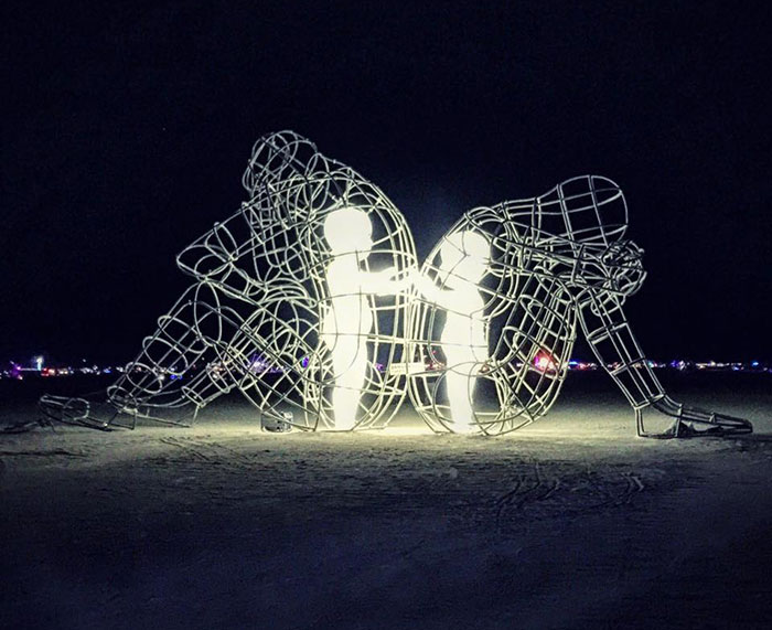 Powerful Sculpture At Burning Man Shows Inner Children Trapped Inside Adult Bodies