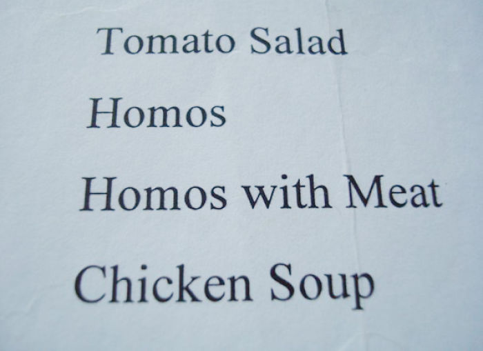 Menu translation fails: humorous translation of "hummus" and "hummus with meat" on a restaurant menu.