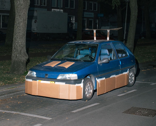 This Guy Walks Around At Night Pimping Random People's Cars With Cardboard