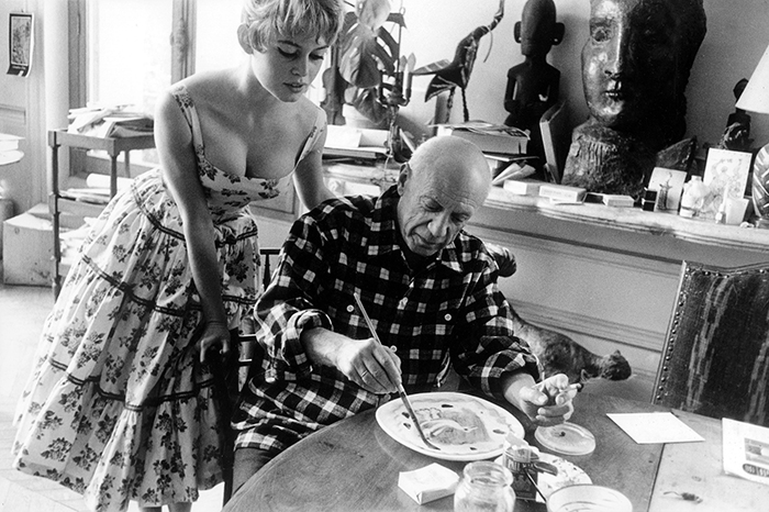 Actress Brigitte Bardot Watching Pablo Picasso At Work In His Studio In Vallauris (1956)