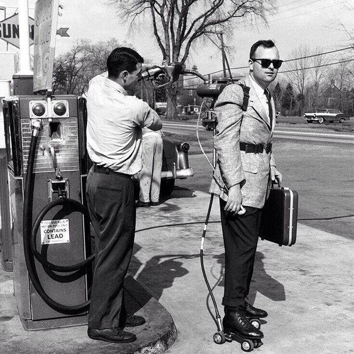Salesman Mike Dreschler Has His Motorised Roller Skates Refuelled At A Petrol Station Near Hartford (1961)