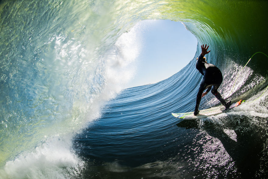 I Photograph Surfers From Inside Barrel Waves At Night