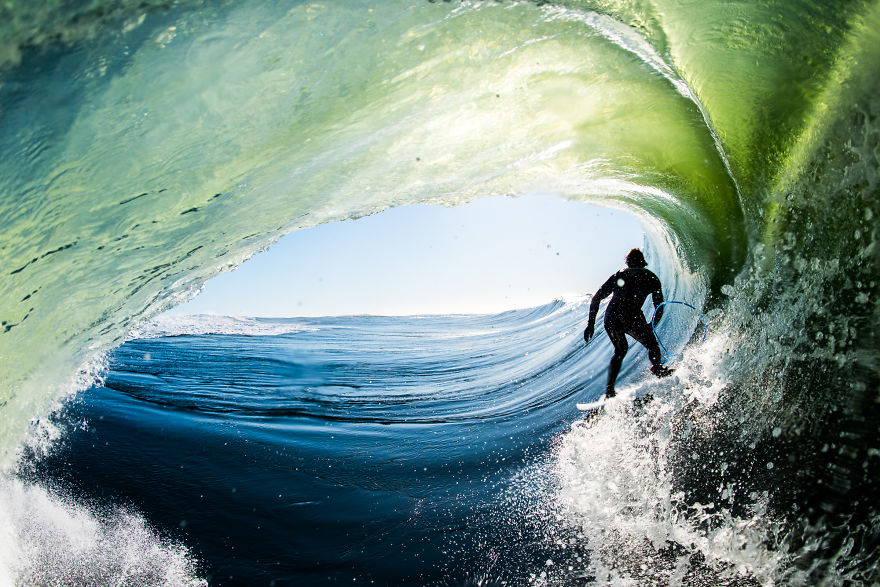 I Photograph Surfers From Inside Barrel Waves At Night