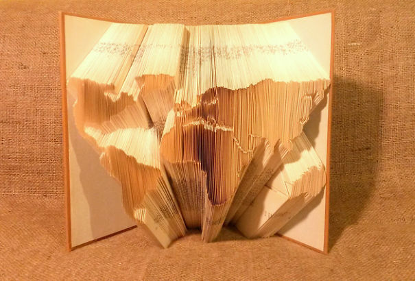Peter Gives A New Life To Books By Making Origami Sculptures