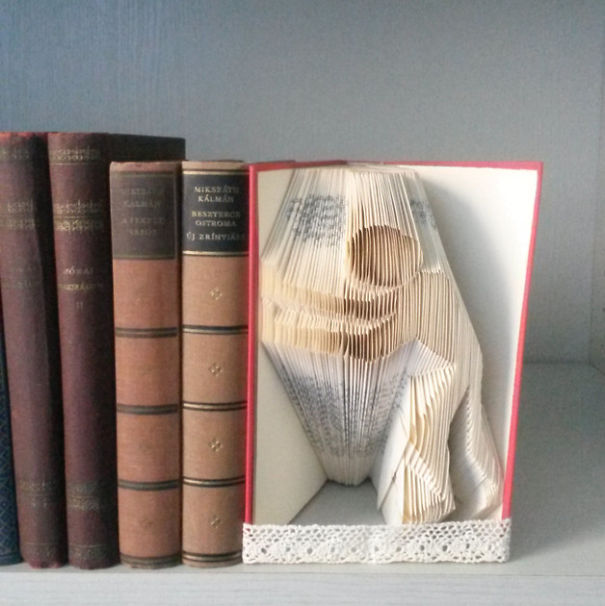 Peter Gives A New Life To Books By Making Origami Sculptures