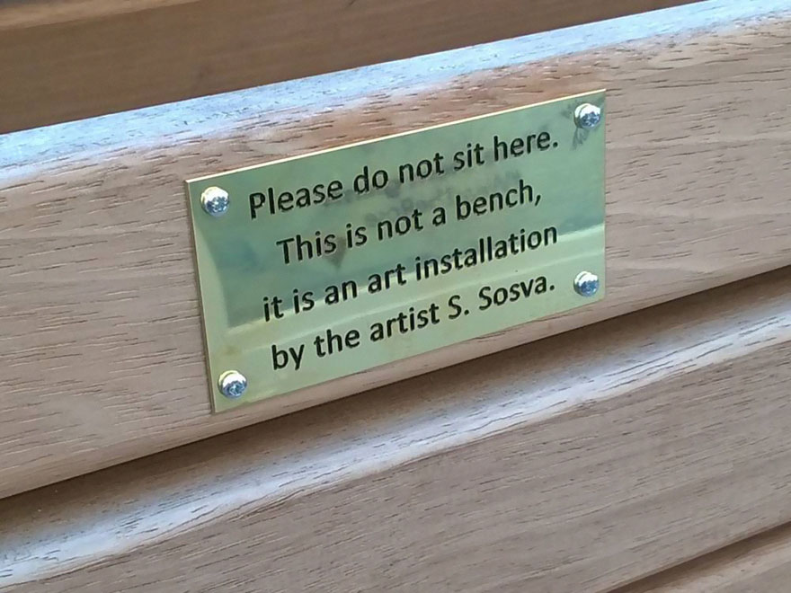 City Council Searches For Pranksters Who Added Funny Signs To Park Benches