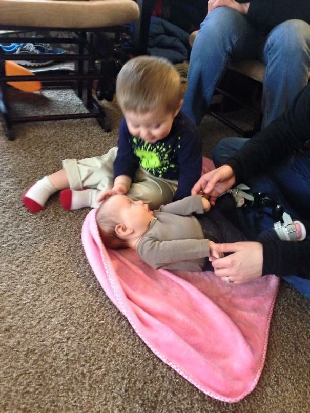 Niece Has Arthrogryposis, My Son Rubs Her Head & Gives Hugs/kisses.always So Concerned.