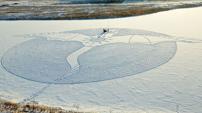 Artist Walks All Day In Siberia To Create Giant Snow Dragon Mural