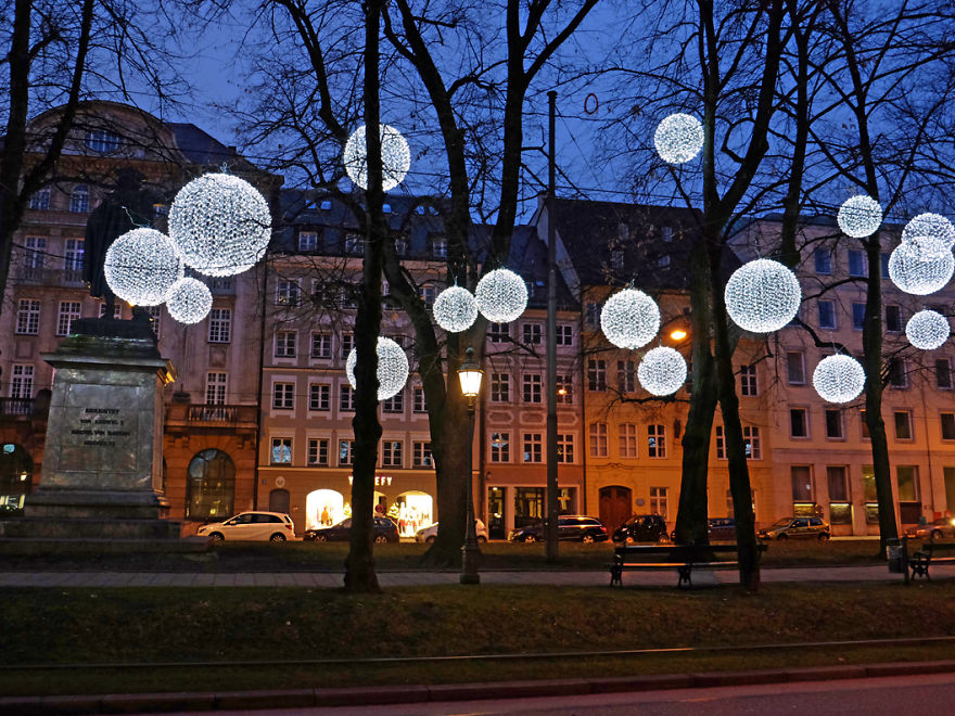 Winter Light Ornaments Float Above The Munich Promenadeplatz In Germany