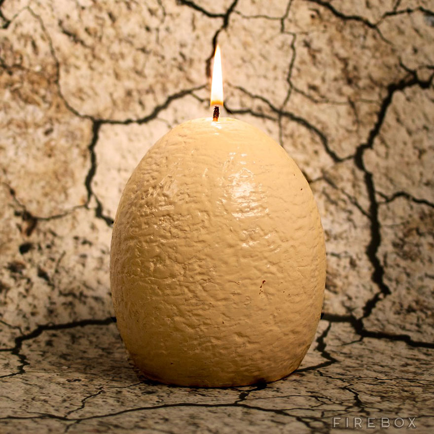Dinosaur Egg Candle That "Hatches" A Baby Raptor When It Melts