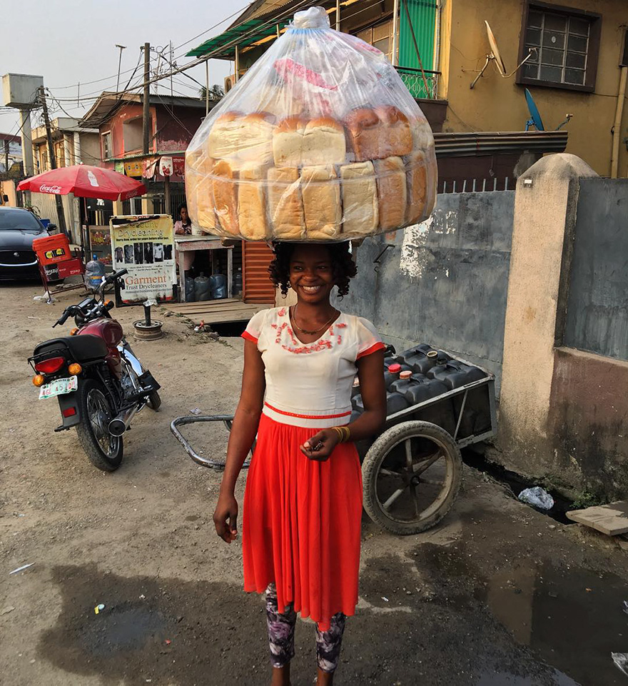 Nigerian Bread Seller Accidentally Photobombs Popstar And Gets Modeling Contract