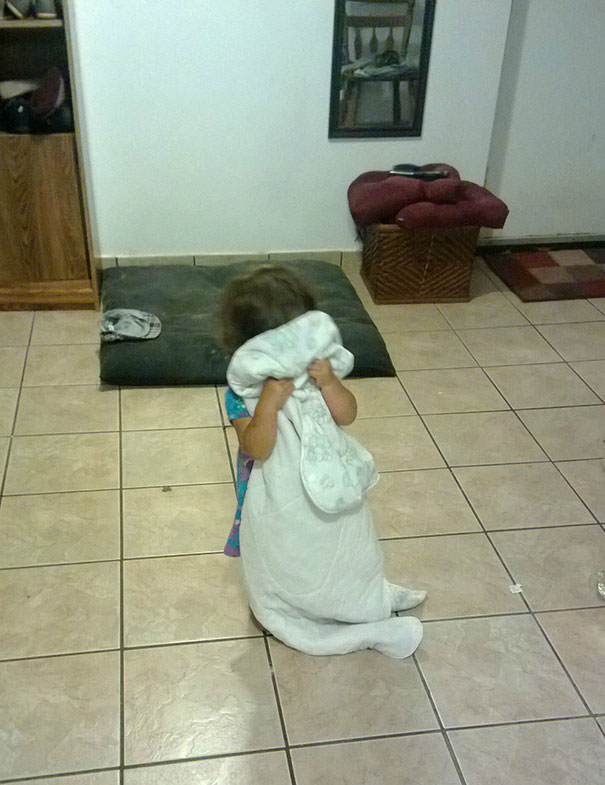 Was Playing Hide And Go Seek With My 2 Year Old Niece, Turned The Corner To See Her Hiding Like This, Completely Immobile